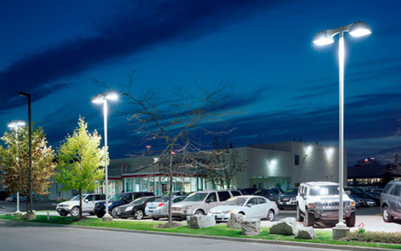 night time auto dealership lighting